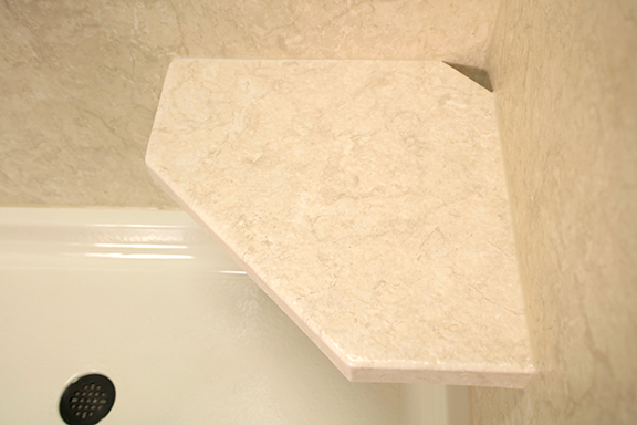 Hexagonal corner shower seat in marble finish