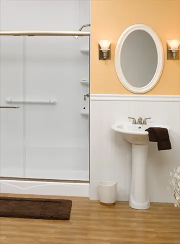 Bathroom with white wainscoting wall panels and shower